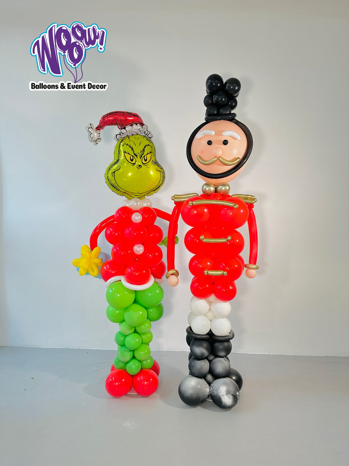 Grinch & Nutcracker Balloon Duo Toronto – 7-8ft tall balloon sculptures for holiday decoration.