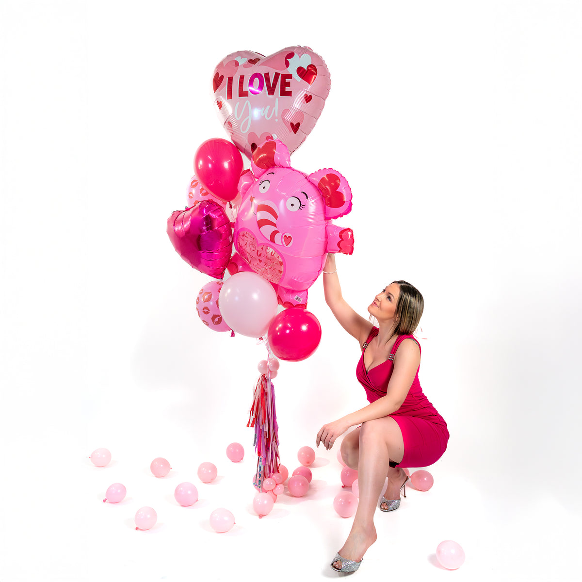 Same-day Valentines balloons Toronto bouquet with biodegradable latex balloons, heart foil balloon, and transport bag.