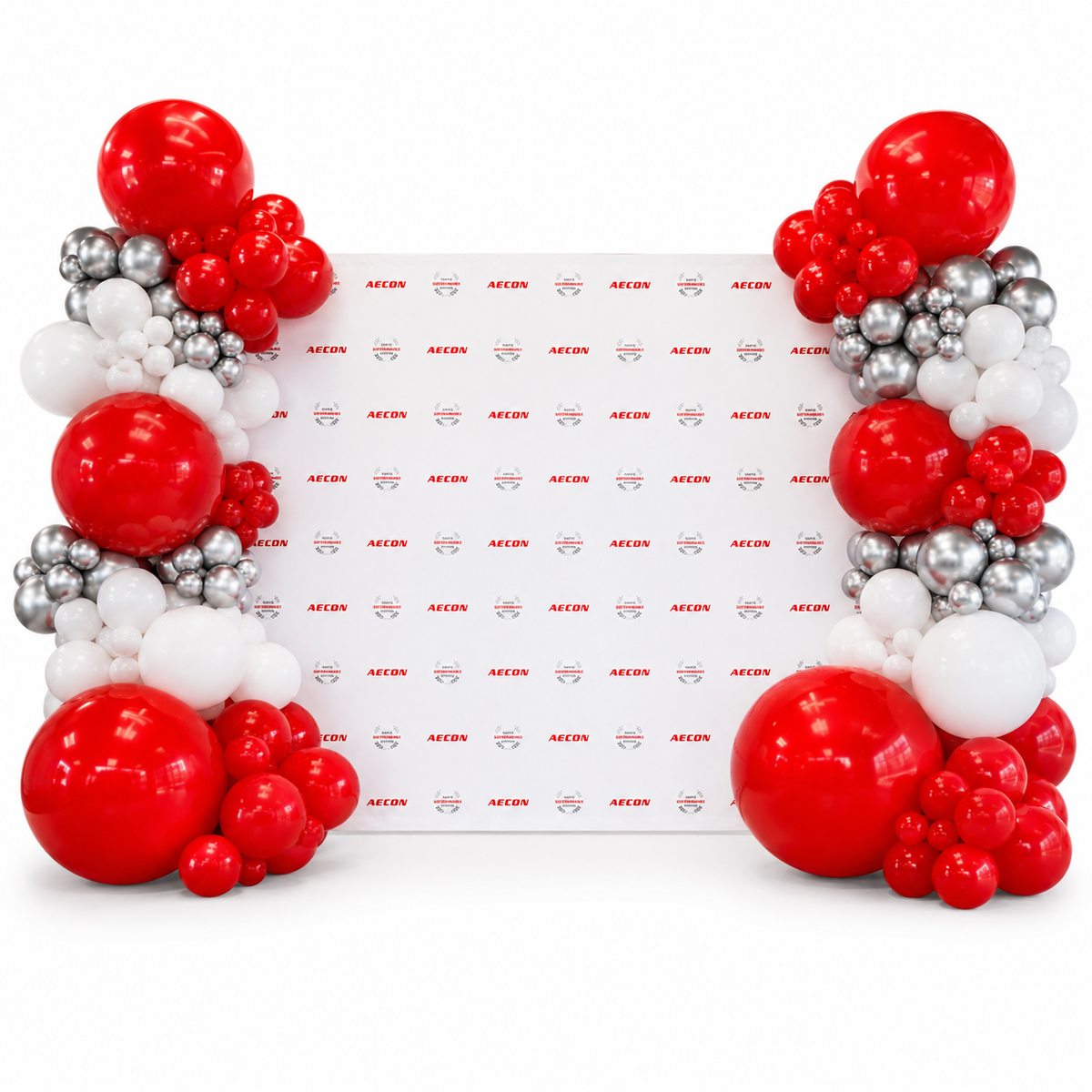 Red, white and silver corporate balloon garlands framing an AECON backdrop