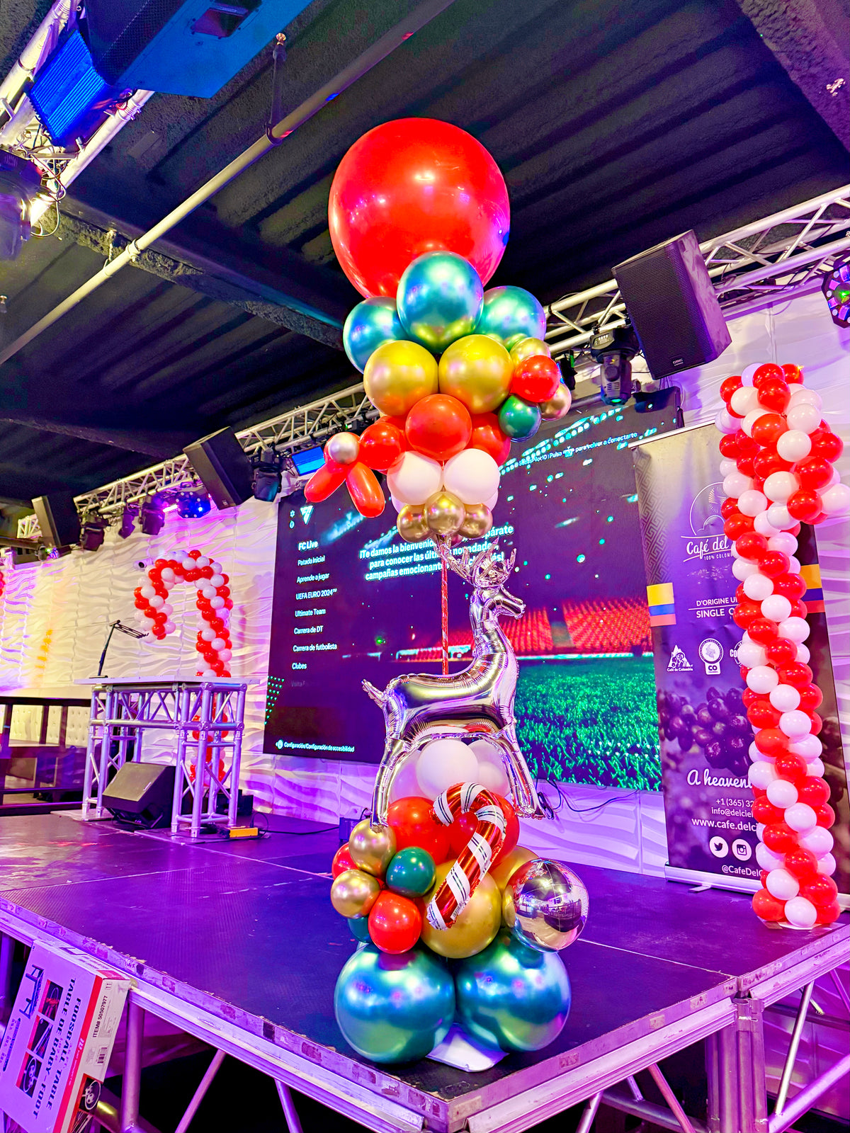 Christmas Balloon Pillar decorated with festive holiday balloons