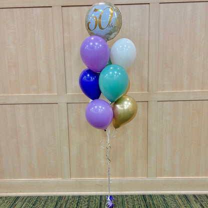gold milestone balloon bouquet Toronto eco-friendly Wooow Balloons GTA