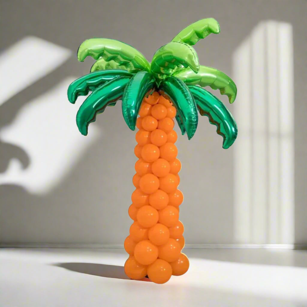 Balloon Palm Sculpture featuring green palm leaf foil balloons and biodegradable latex balloons