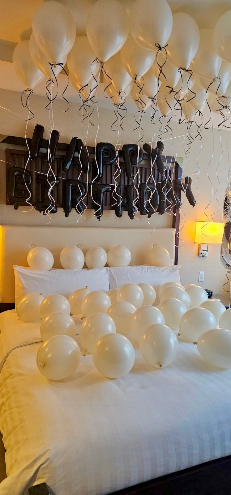 Creamy Blush Birthday Room Decor with helium balloons, banner, and number stands Toronto