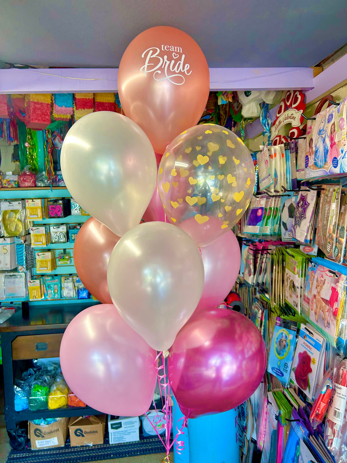 Bride Balloon Bouquet with helium-filled biodegradable balloons in a bunch of 7, including balloon weight and transport bag.
