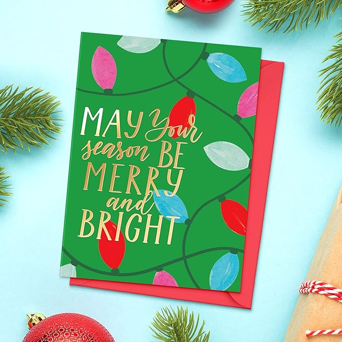 Christmas card with colorful lights and text on a blue background