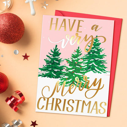 Christmas card with trees and text on a festive background