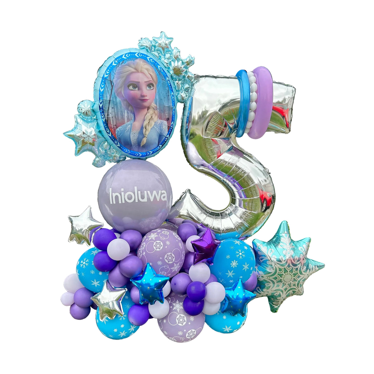 Frozen-themed balloon arrangement with Elsa and number balloon for a birthday celebration.