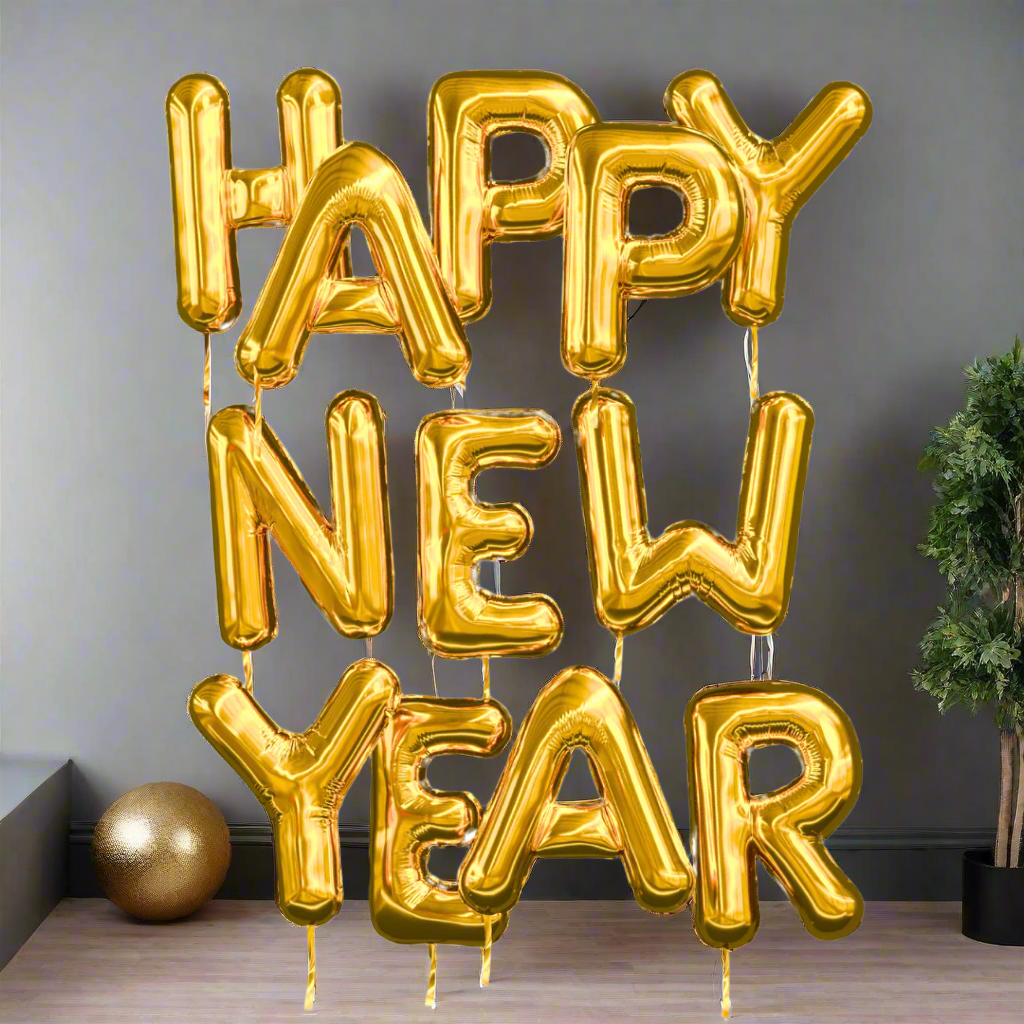 Happy New Year Letter Balloons in gold and silver foil, 34-inch helium-filled letters.