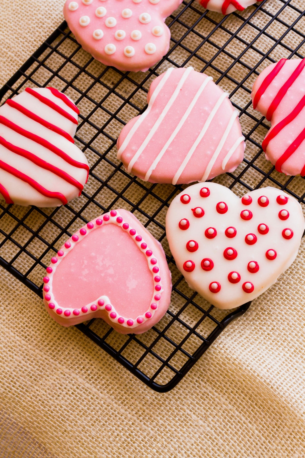 Valentine’s Day heart cookies in vanilla and chocolate, decorated with sugar icing.