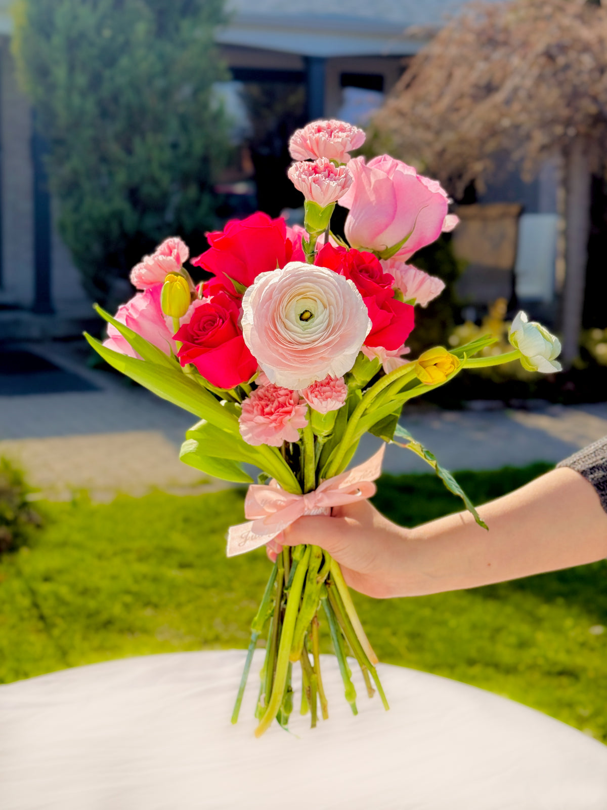 Hand-tied Mother’s Day flower bouquet with gerberas and seasonal blooms in Toronto