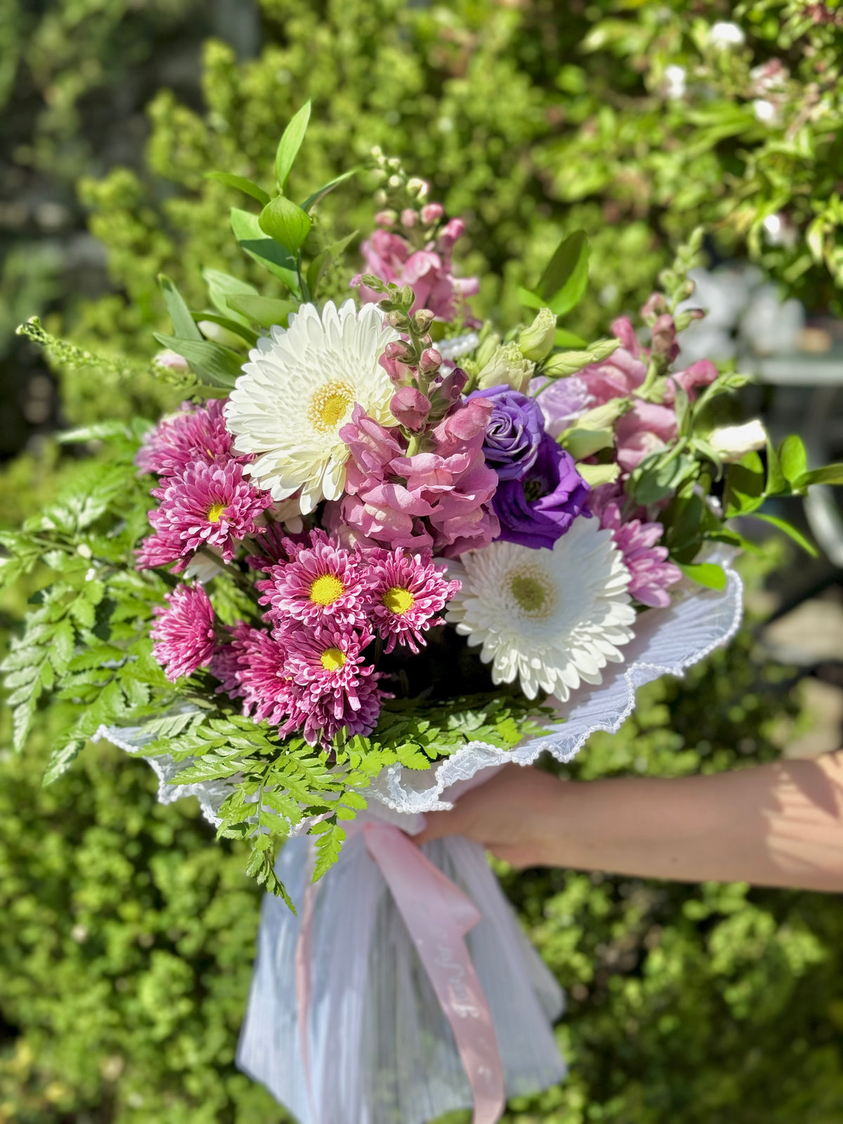 Bouquet of purple flowers for mother's day in Toronto.