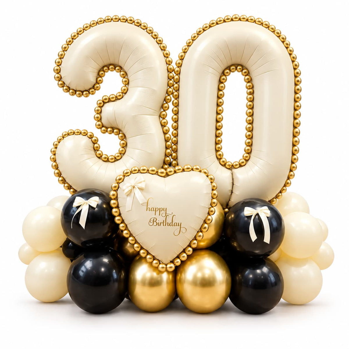 30th birthday balloon arrangement by Wooow Balloons in Toronto, featuring cream number balloons with gold beaded trim, black and gold balloons and a Happy Birthday heart.