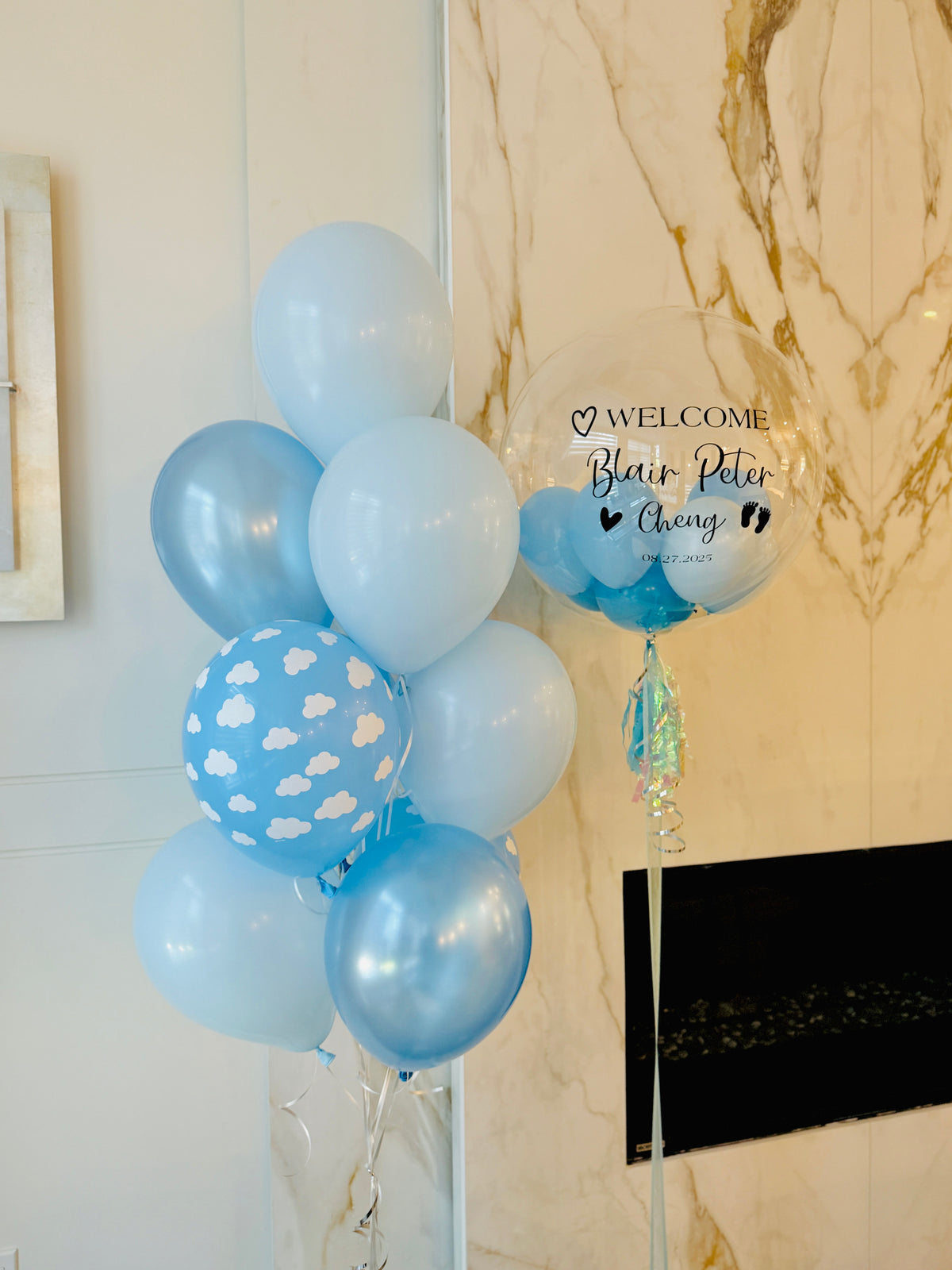 Blue balloons with cloud pattern for baby boy new born balloon bouquet in Toronto.