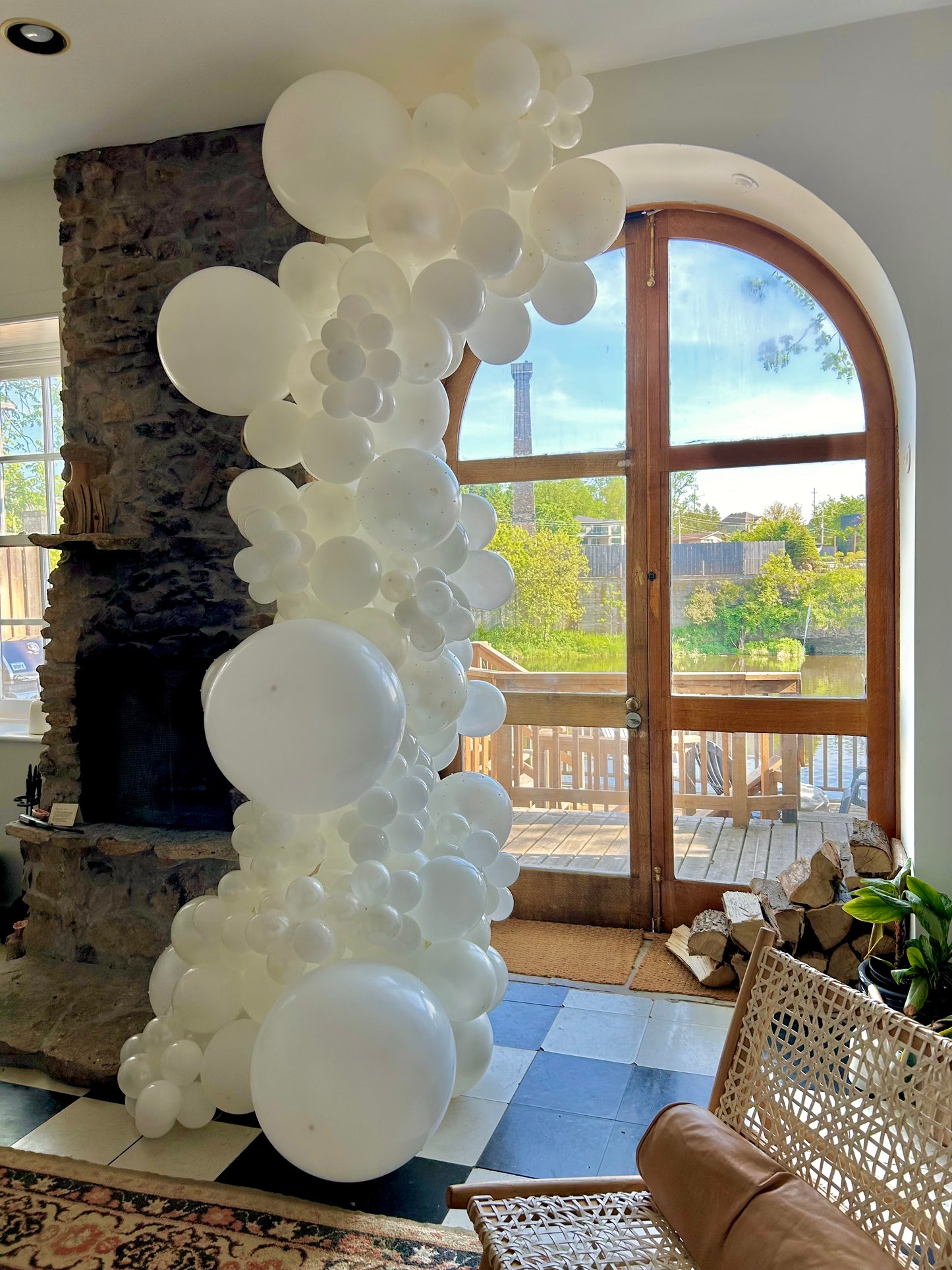 Elegant organic balloon garland in white, designed for luxury home décor, weddings, and stylish event setups.