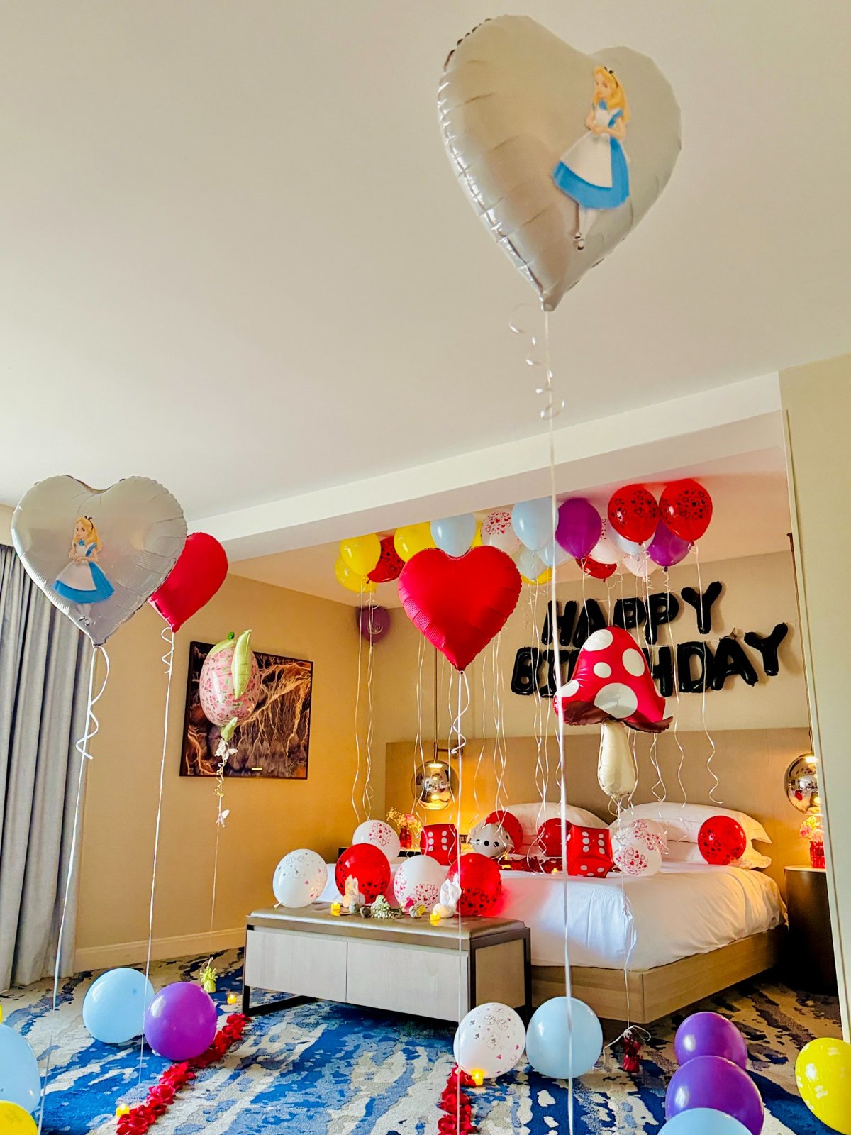 Wonderland birthday decor with mushrooms and teapot balloons