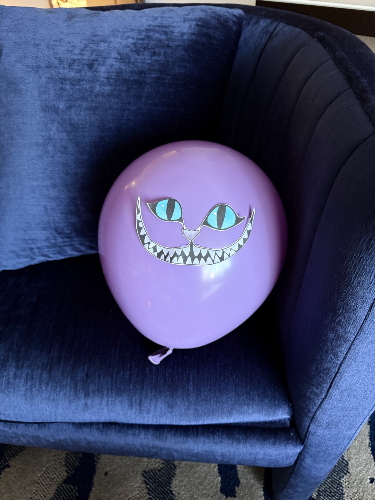 Purple Cheshire Cat balloon from Wonderland theme Toronto