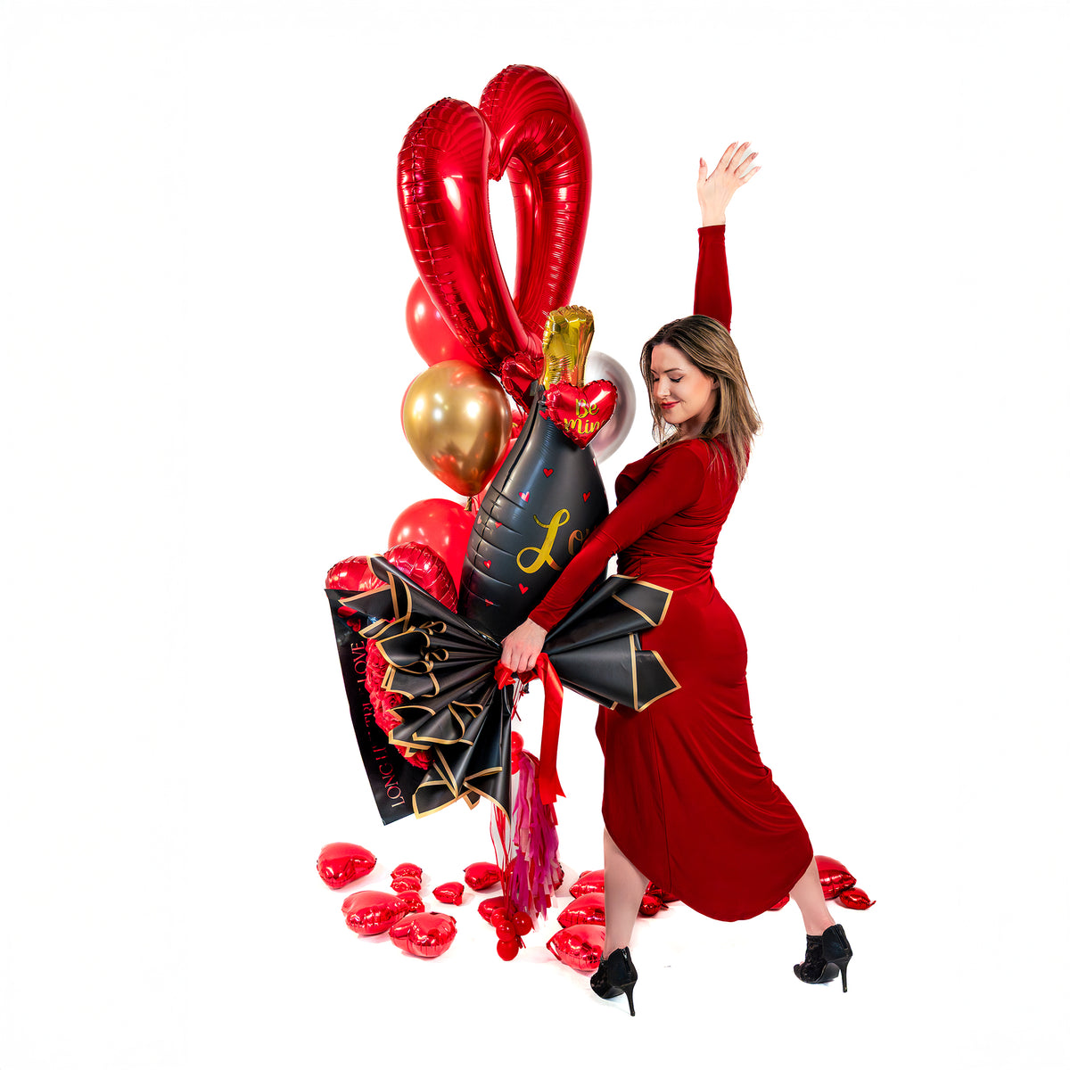 Valentine balloon bouquet Toronto side view with metallic balloons, heart accents, and tassel weight