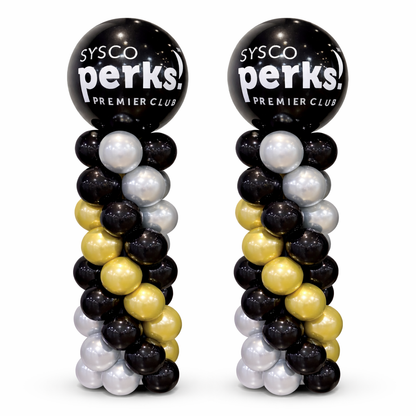 Two corporate balloon columns with custom logo in black, gold and silver, premium event decor for entrances and stage setups in Toronto, branded balloon pillars with same day delivery available