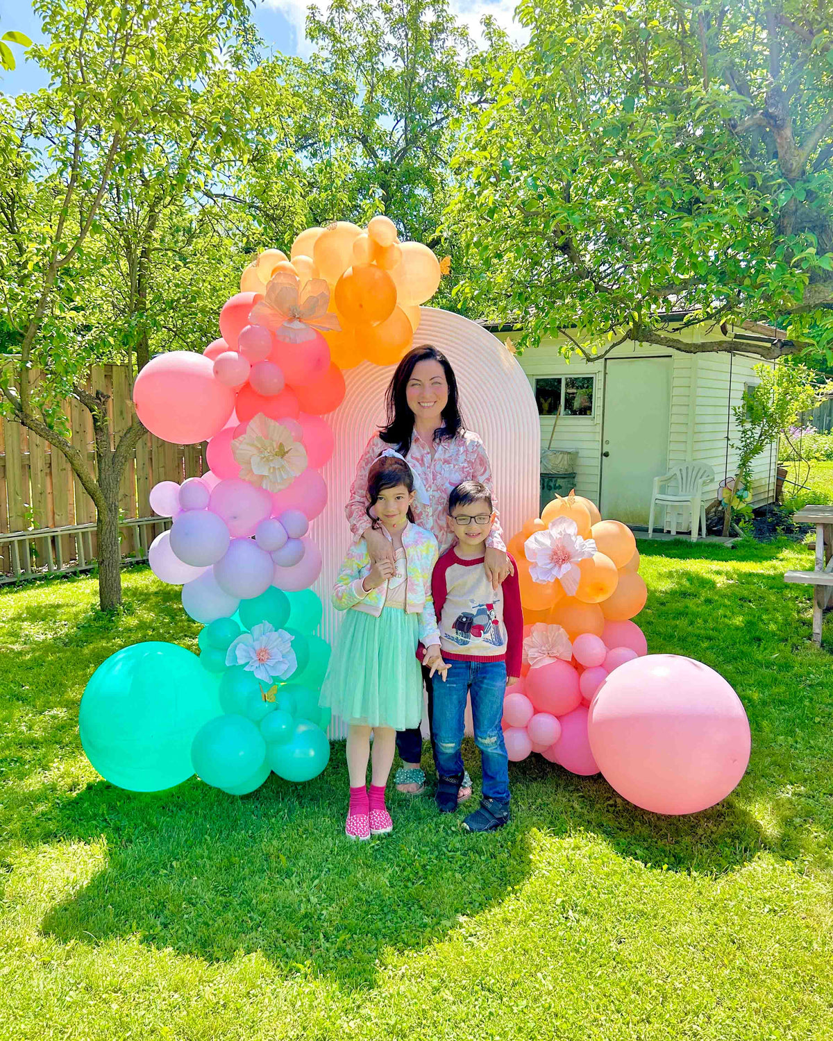 Custom backdrop with pastel balloon garland Toronto – Wooow Balloons event decor for birthdays and outdoor celebrations