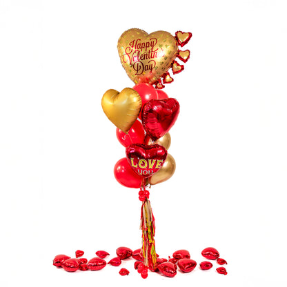 Golden heart Valentine balloon bouquet in red and gold, styled for a romantic surprise