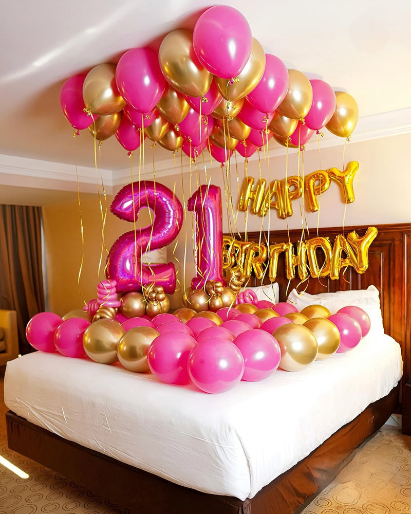 Happy Birthday hotel room decoration Toronto – pink and gold balloon setup with ceiling balloons, number balloons and bed decoration by Wooow Balloons
