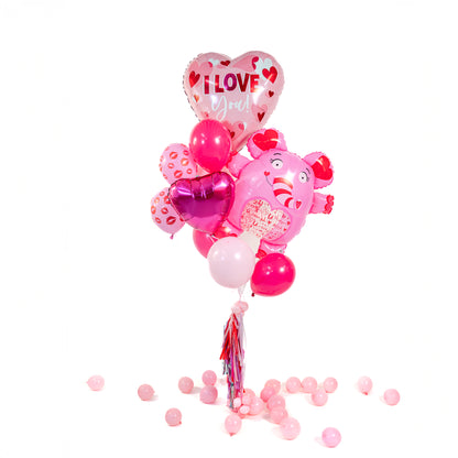 Close-up of Love Elephant Valentine Balloon Bouquet in Toronto with I Love You heart balloon, elephant character balloon, heart foil and latex balloons.