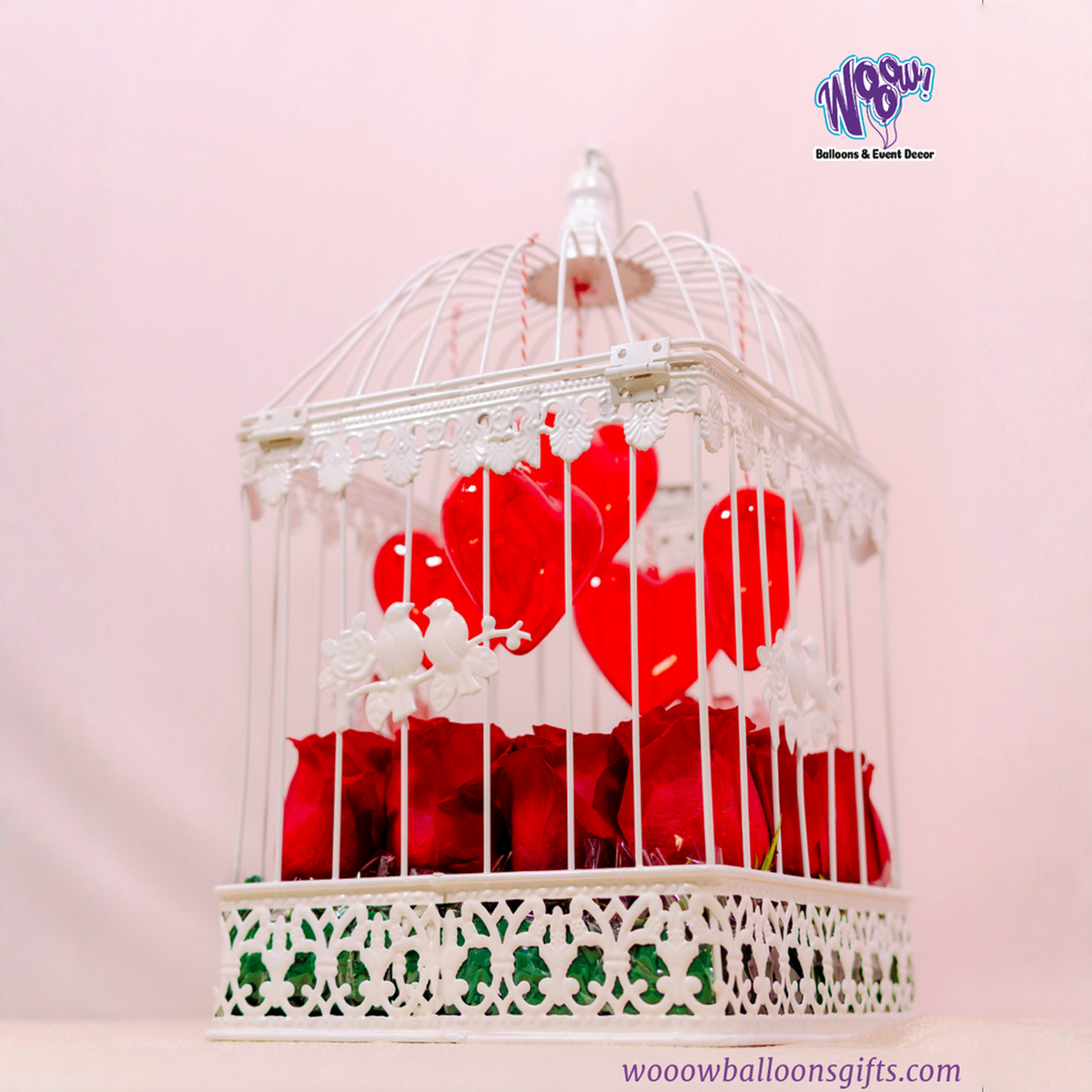 Red roses birdcage gift in Toronto with heart accents for Valentine’s Day