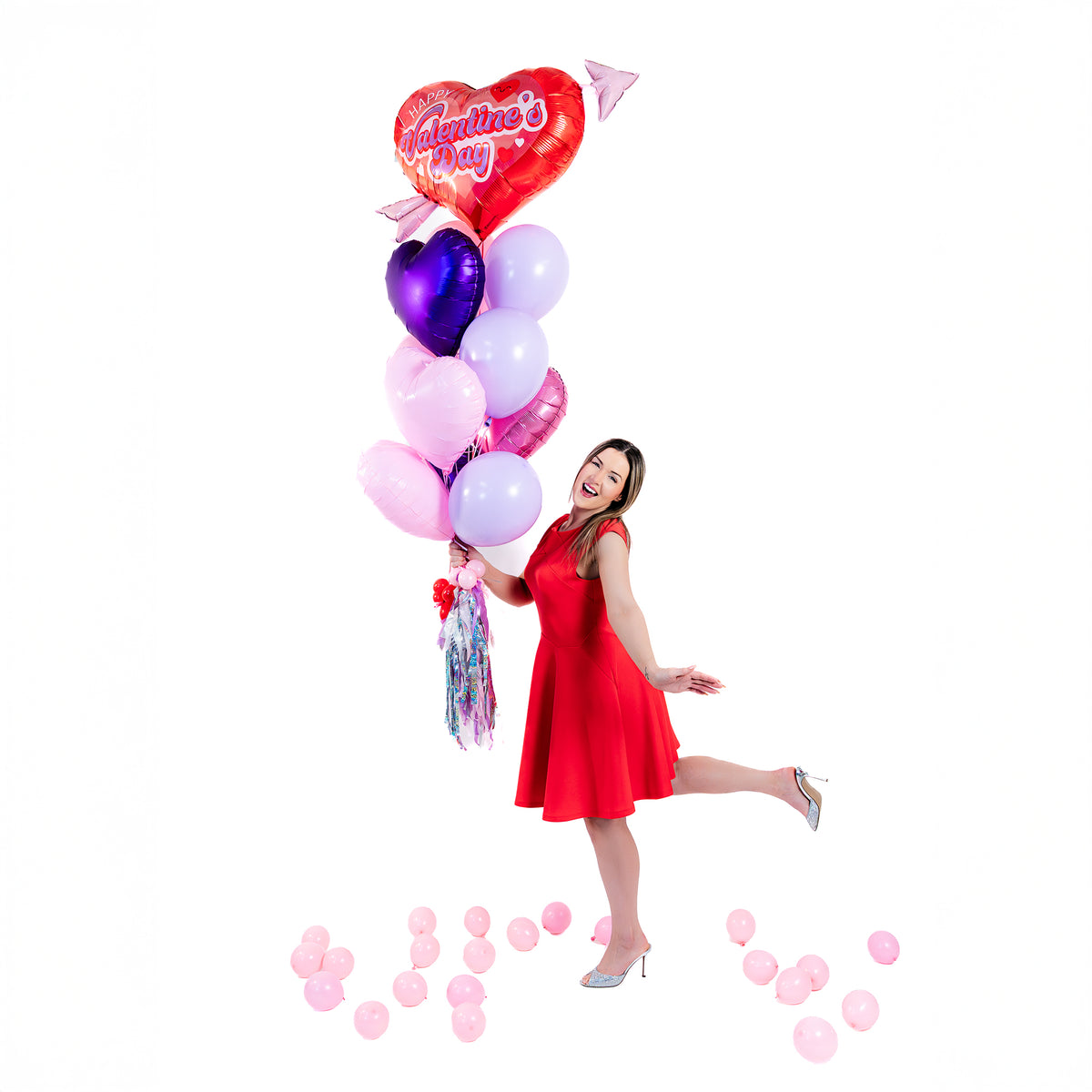 Wooow Balloons holding the Retro Cupid Heart Balloon Bouquet – Valentine's Day balloons Toronto