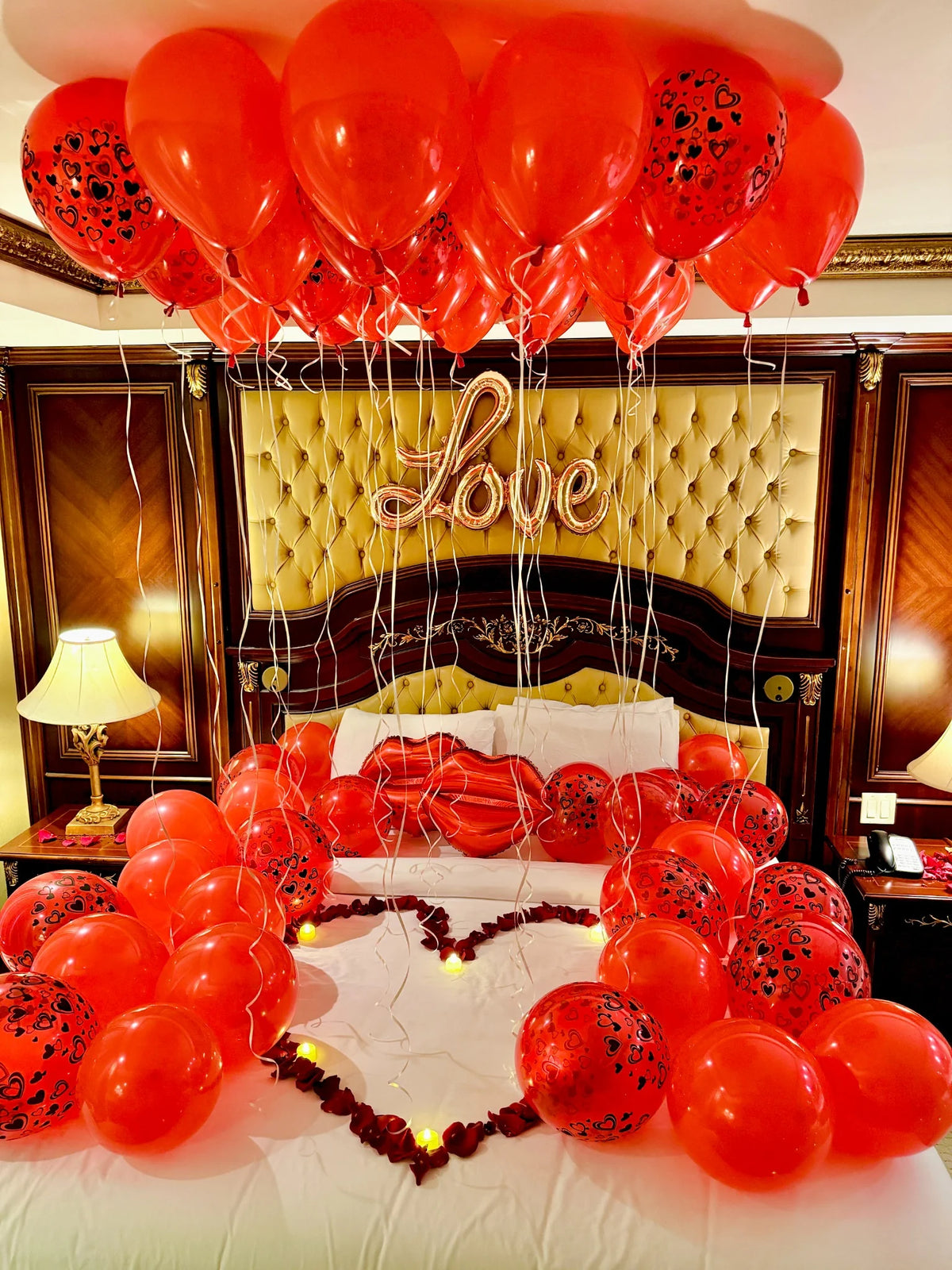 Romantic hotel room balloon decorations professionally installed in Toronto