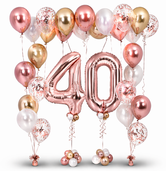Luxury rose gold 40th birthday balloon arrangement with jumbo rose gold number balloons, blush pink, white, and gold helium balloons for elegant party decor in Toronto.