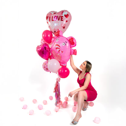 Same-day Valentines balloons Toronto bouquet with biodegradable latex balloons, heart foil balloon, and transport bag.