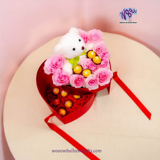 Close-up of teddy bear rose box with Ferrero Rocher chocolates and pink roses, romantic gift in Toronto