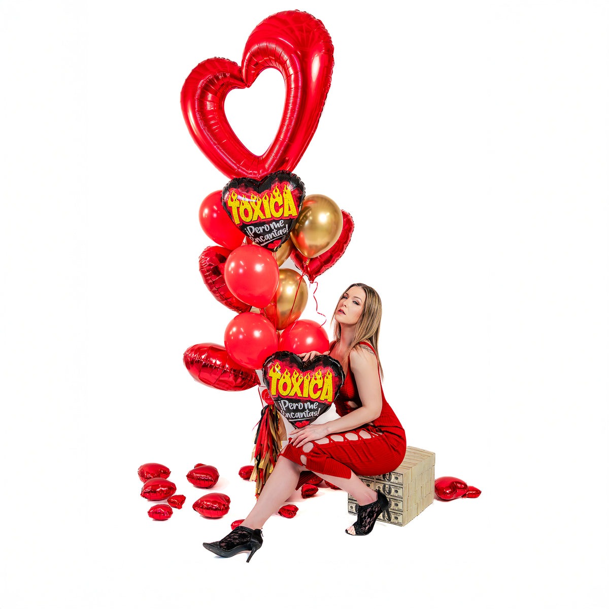 Valentines balloons Toronto styled bouquet with red open-heart balloon, “Tóxica” heart balloon, tassel weight, and romantic red-gold colour palette.